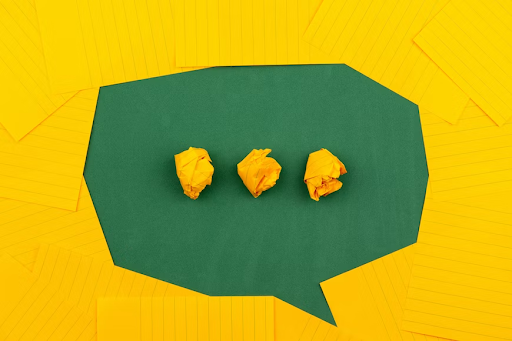 A message bubble constructed from vibrant, colorful paper, adding a playful touch to communication.